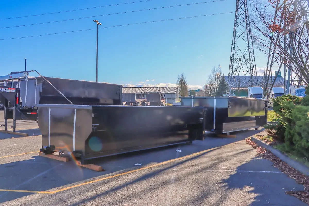 Roll-off dumpster ready for waste disposal at job site for 4 Yard Dumpster Rental in Sand Springs